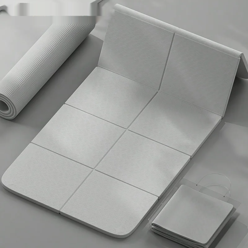 Eco-friendly foldable tpe yoga mat with non-slip double-sided texture and carry strap - product image